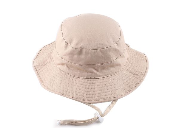 Slant de sombrero de cubo beige de algodón reversible en blanco con cuerda